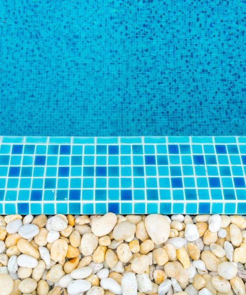 Blue swimming pool rippled water